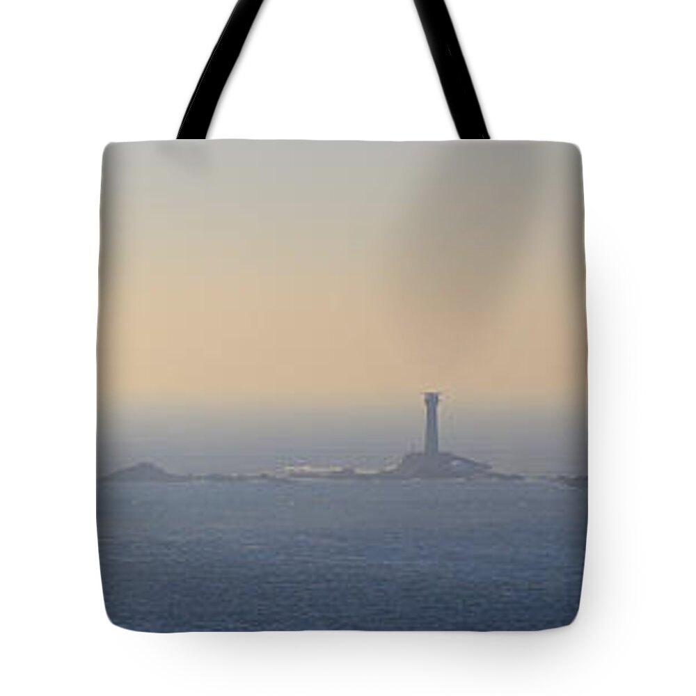 Lighthouse Tote Bag featuring the photograph The Longships Lighthouse Cornwall by Tony Mills