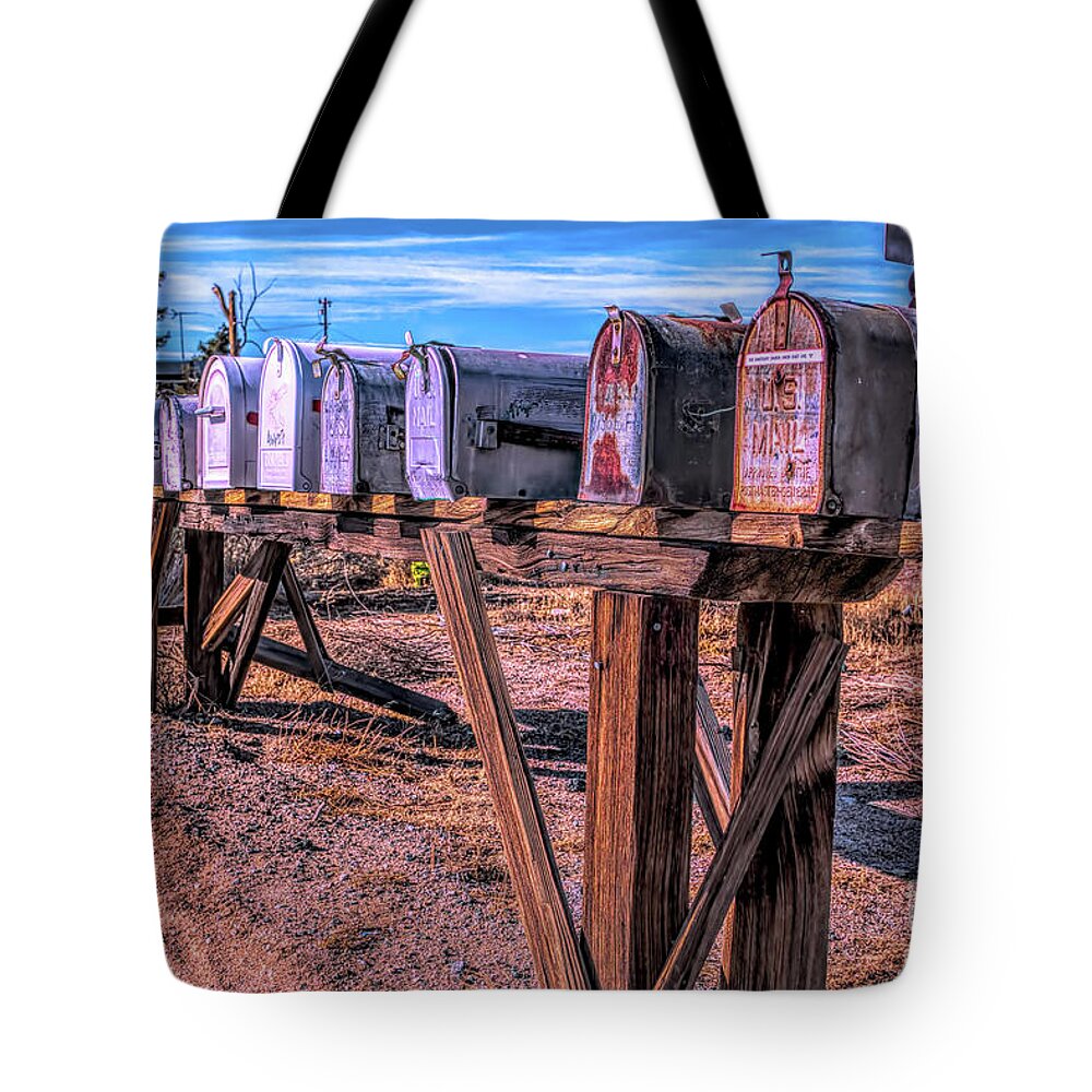 Mailboxes; Row Of Mailboxes; Mojave Desert; Colorful; Blue; Red; Yellow; Brown; Green; Trees; Joe Lach Tote Bag featuring the photograph The Mailboxes by Joe Lach