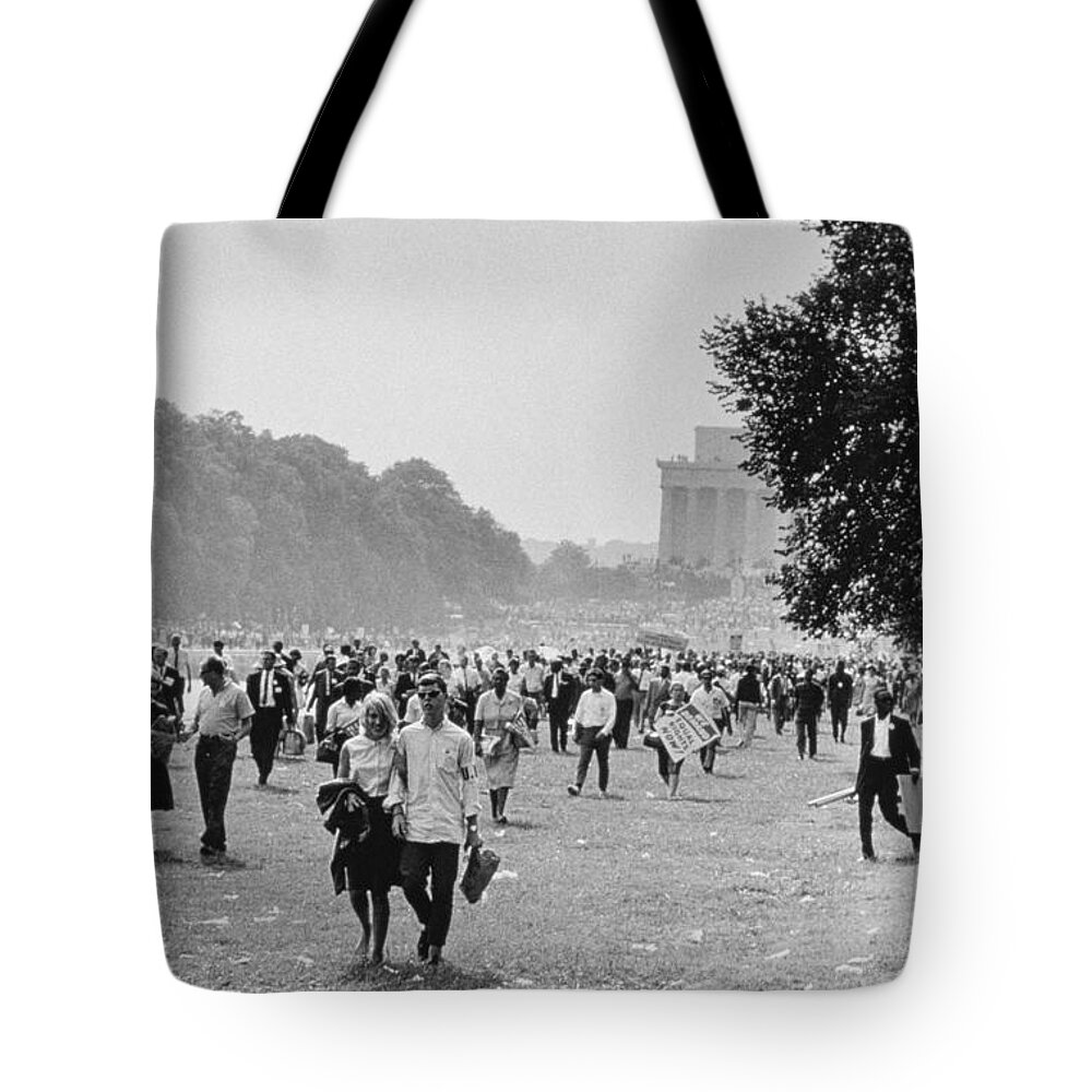 Photo Tote Bag featuring the photograph The March on Washington Heading Home by Nat Herz