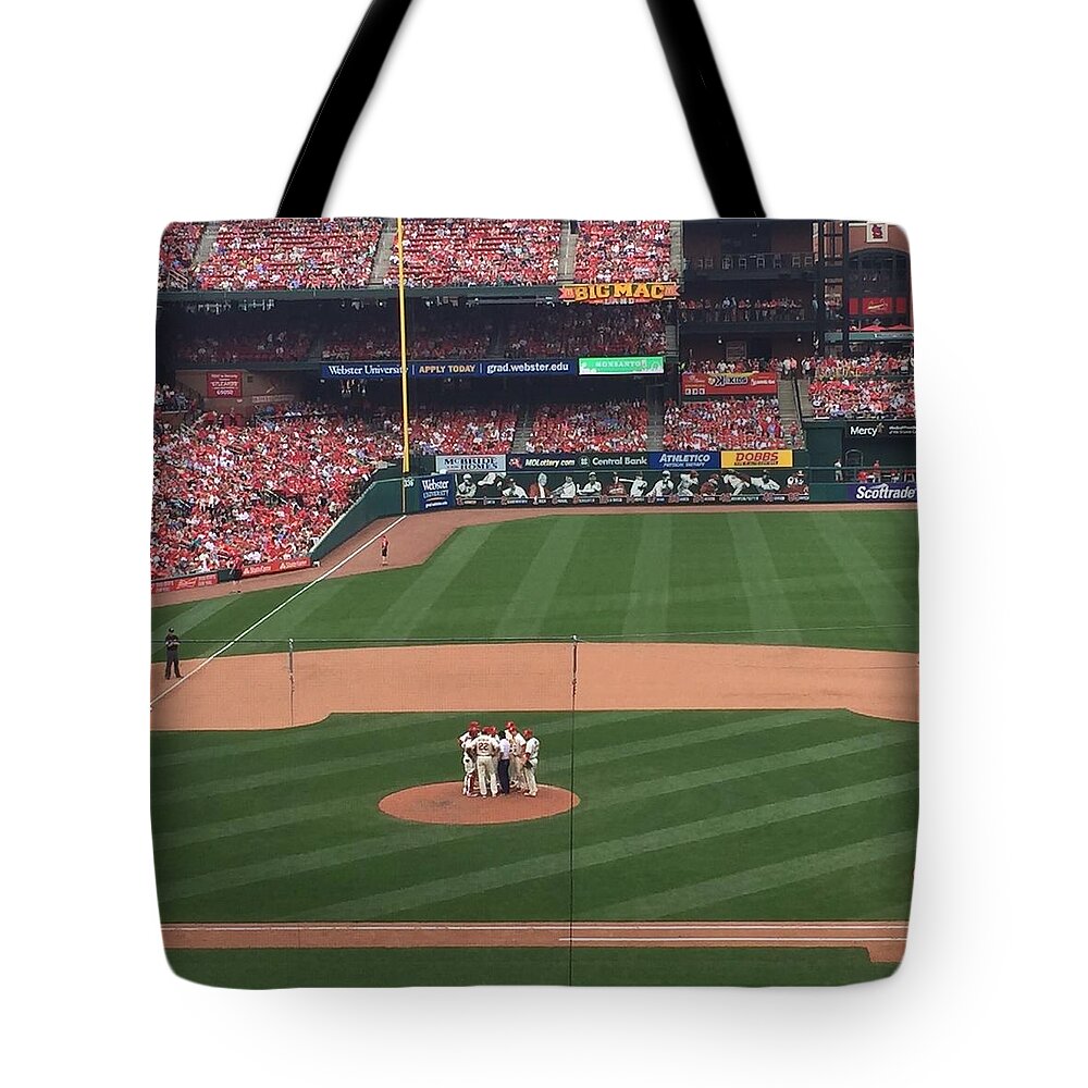  Tote Bag featuring the photograph The Meet by Sue Morris