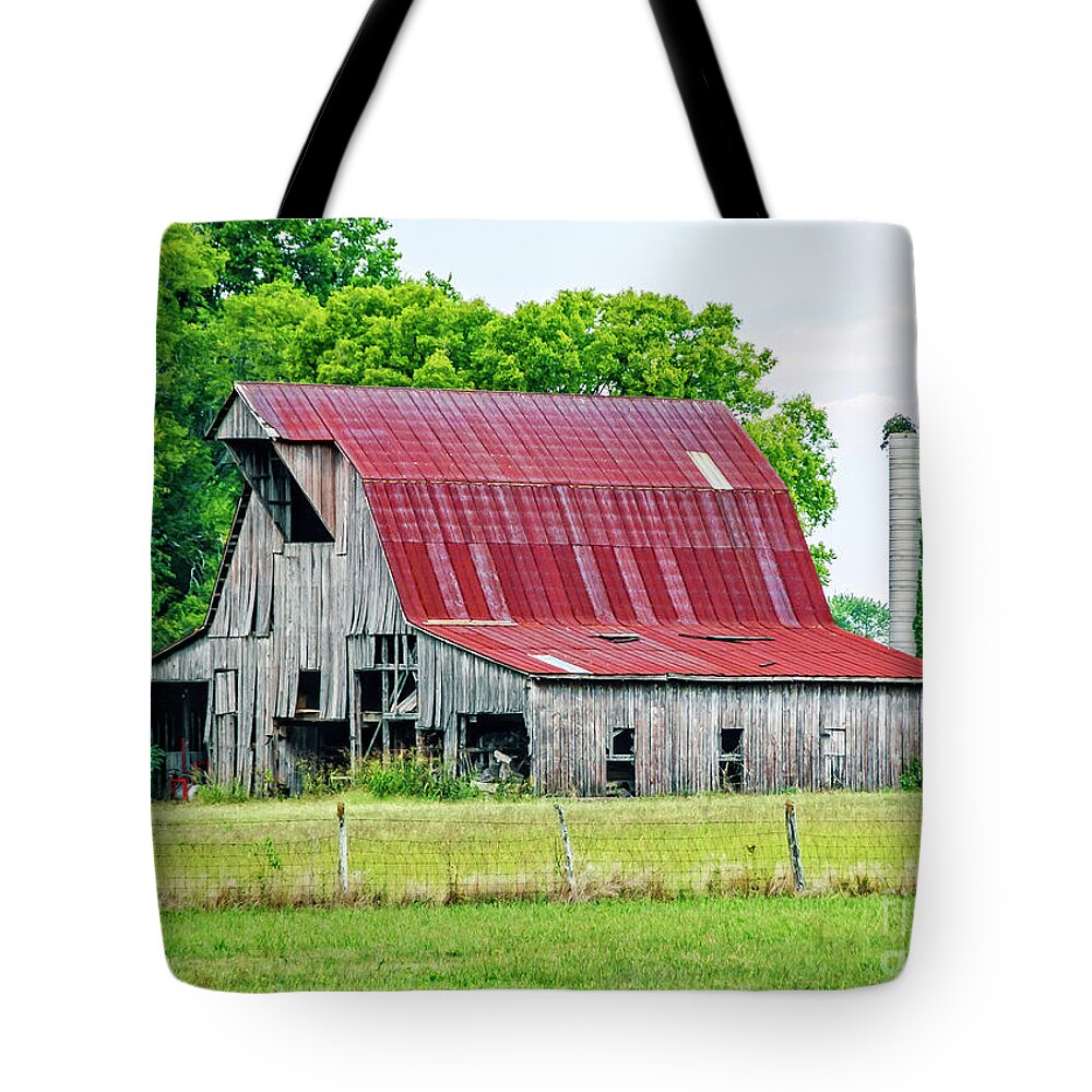 Art Tote Bag featuring the photograph The Old Barn by Charles Dobbs