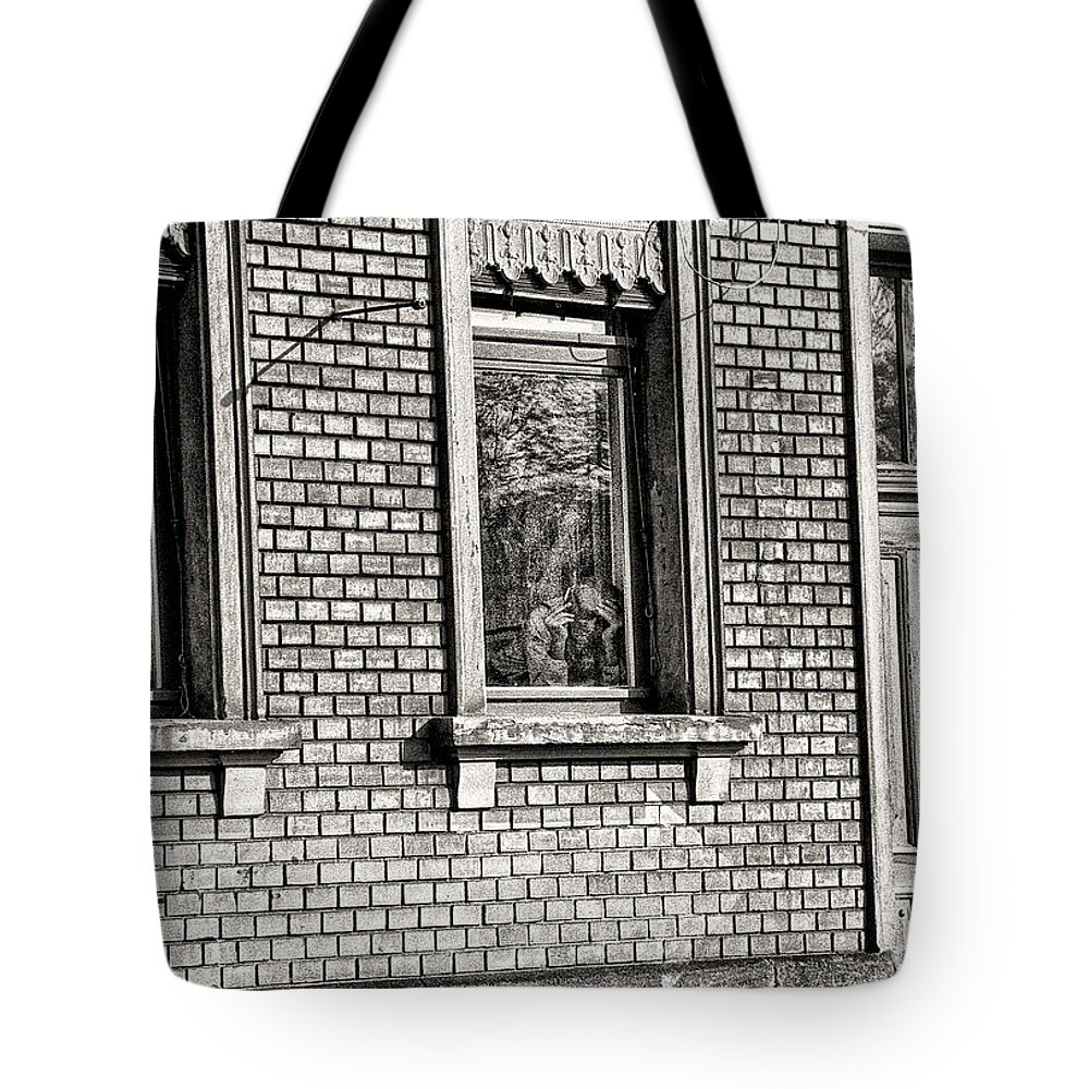 Old Man Tote Bag featuring the photograph The Old Man In The Window by Jeff Breiman