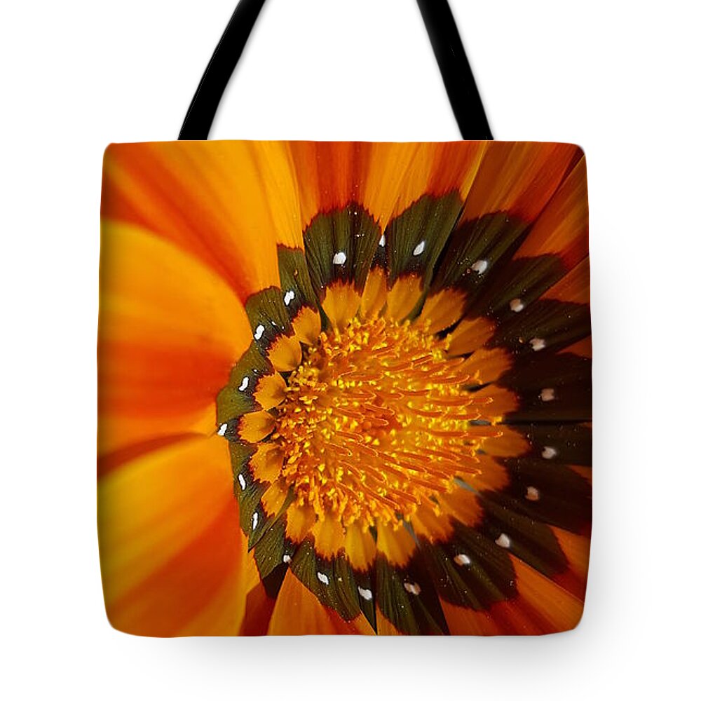 Orange Tote Bag featuring the photograph The Orange Flower by Maria Aduke Alabi