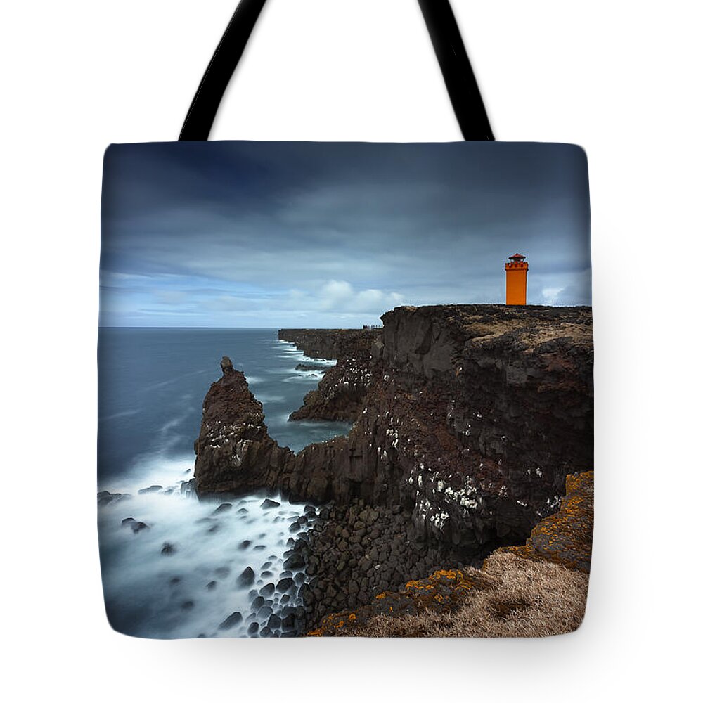 Lighthouse Tote Bag featuring the photograph The orange Lighthouse by Dominique Dubied