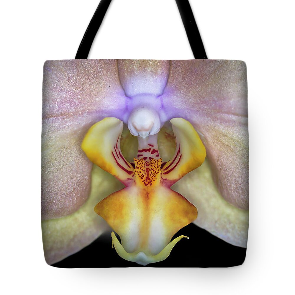 Orchid Tote Bag featuring the photograph The Orchid by The Flying Photographer