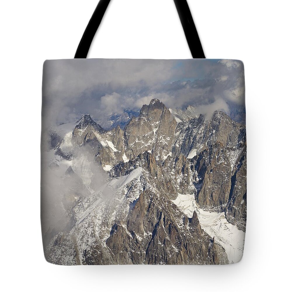 Aiguille Du Midi Tote Bag featuring the photograph The Pinnacle by Stephen Taylor