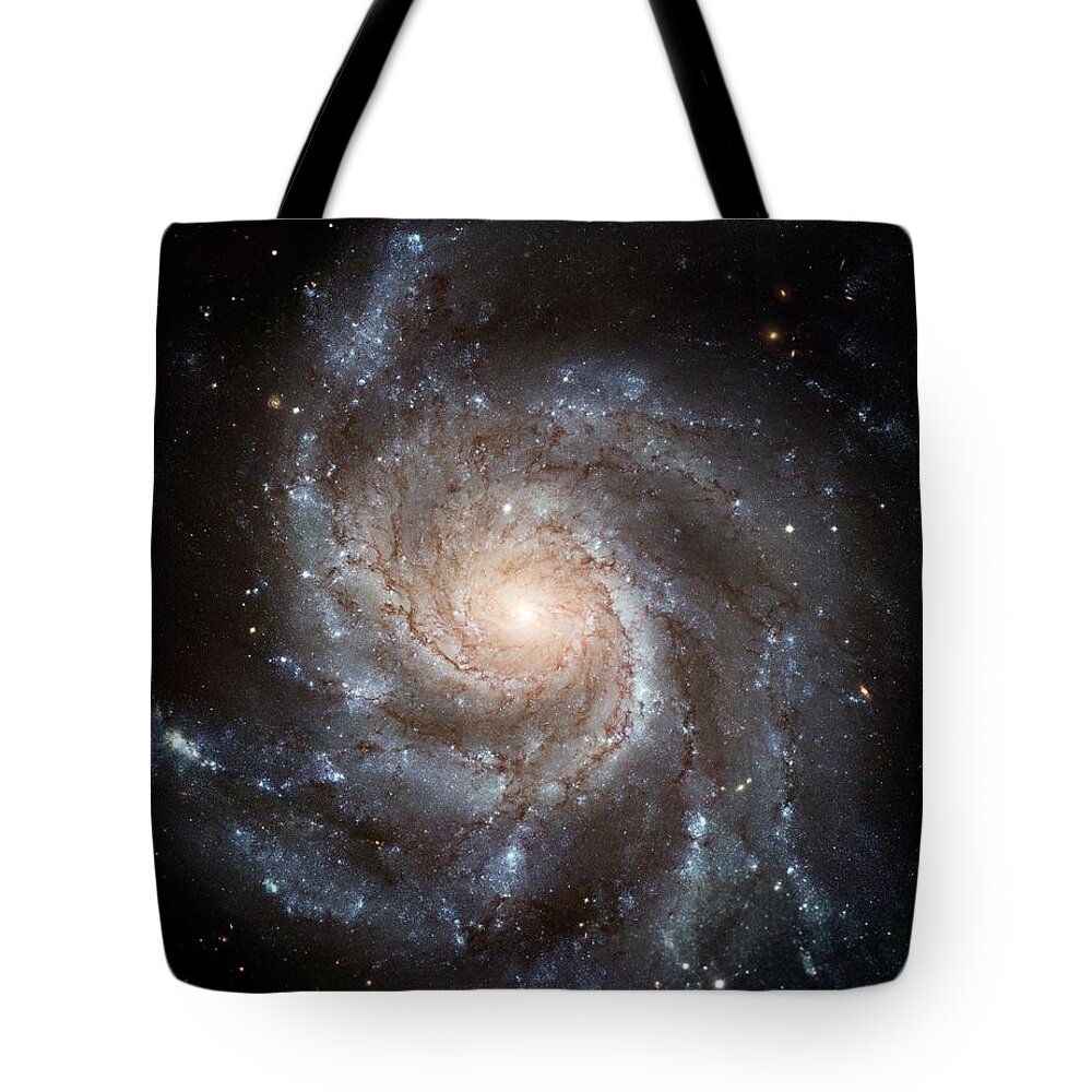 Pinwheel Tote Bag featuring the painting The Pinwheel Galaxy by Hubble Space Telescope