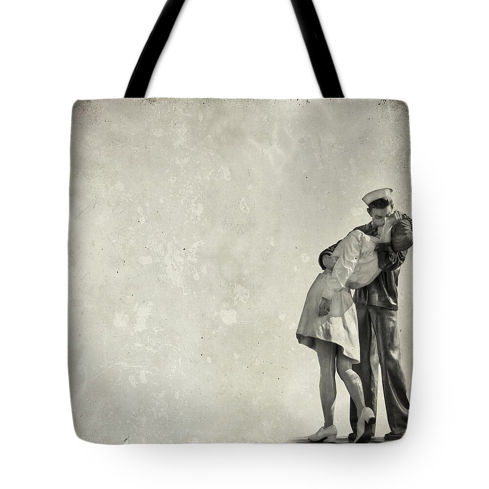 Kiss Tote Bag featuring the photograph The Power of a Kiss by Evelina Kremsdorf