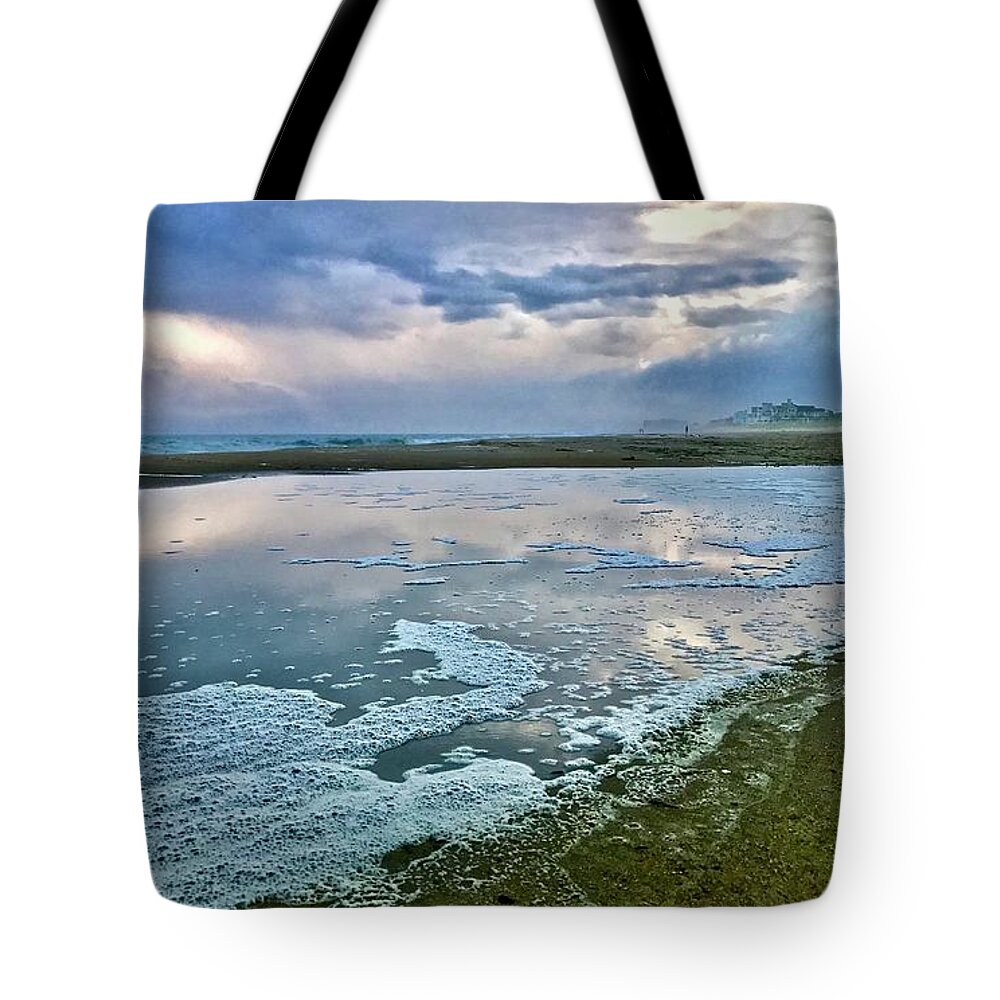Beach Tote Bag featuring the photograph The Reflection of the Storm by Shawn M Greener