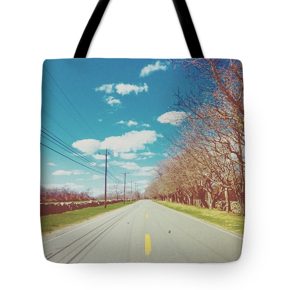 Road Tote Bag featuring the photograph The Road Between Nature And Technology by Kate Arsenault 