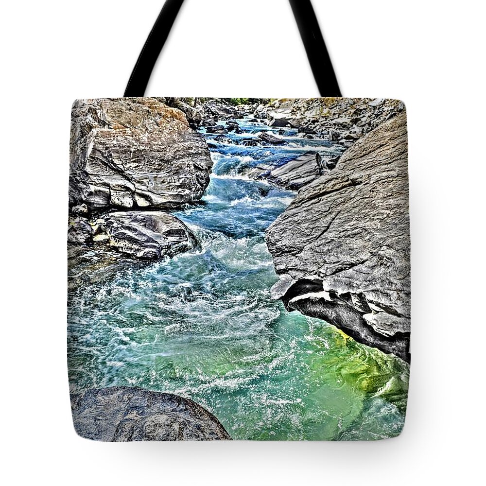 River Tote Bag featuring the photograph The Rock Face by Michael Brungardt