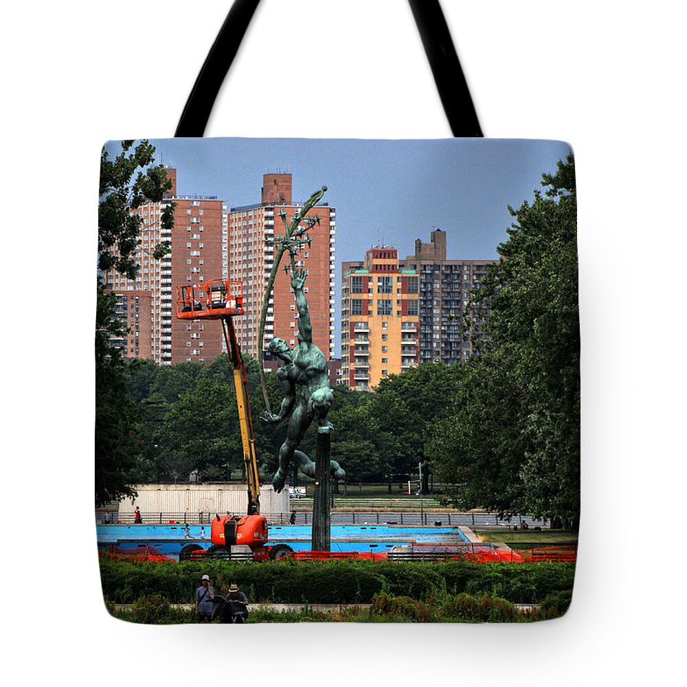 Rocket Tote Bag featuring the photograph The Rocket Thrower by Mike Martin