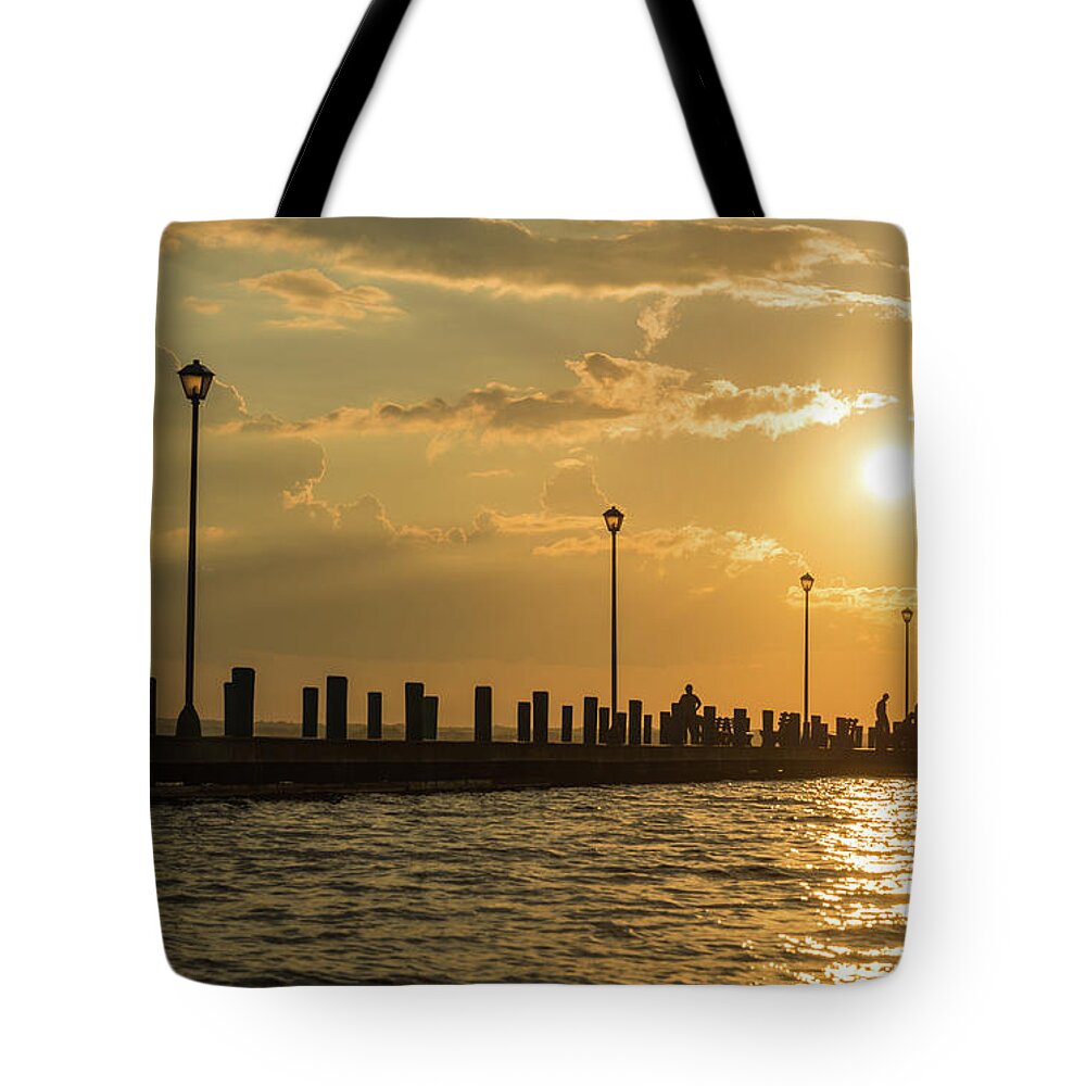 Seaside Park Tote Bag featuring the photograph The Sun at the End by Kristopher Schoenleber