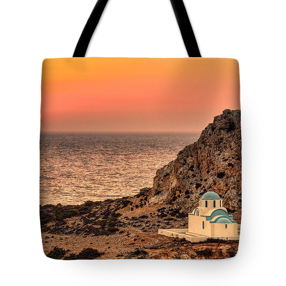 Finiki Tote Bag featuring the photograph The sunset in Finiki of Karpathos - Greece by Constantinos Iliopoulos
