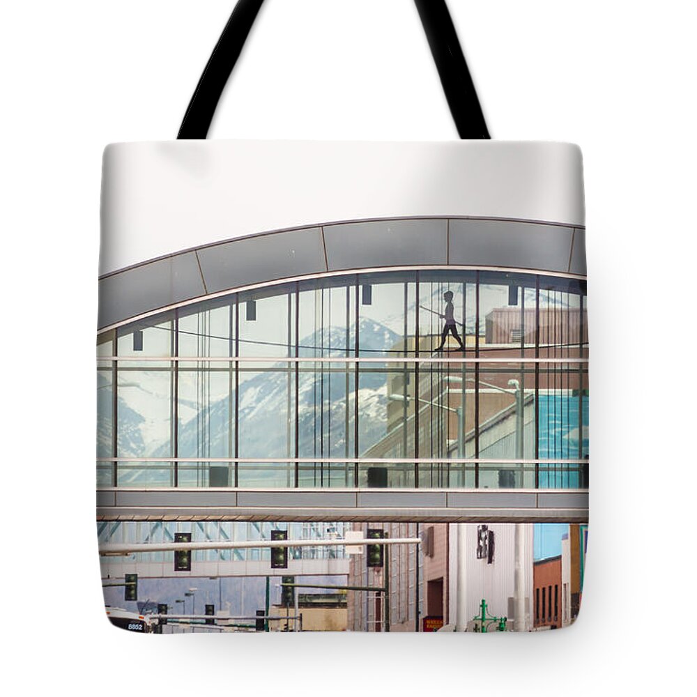 Landscape Tote Bag featuring the photograph The Tightrope Forever by Charles McCleanon