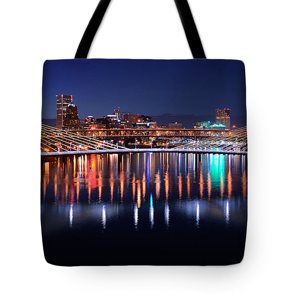 Portland Oregon Tilikum Crossing Bridge Willamette River Downtown Cityscape Dusk Blue Hour Night Evening Water Long Exposure Reflection Color Colorful Tote Bag featuring the photograph The Tilikum Crossing by Patrick Campbell
