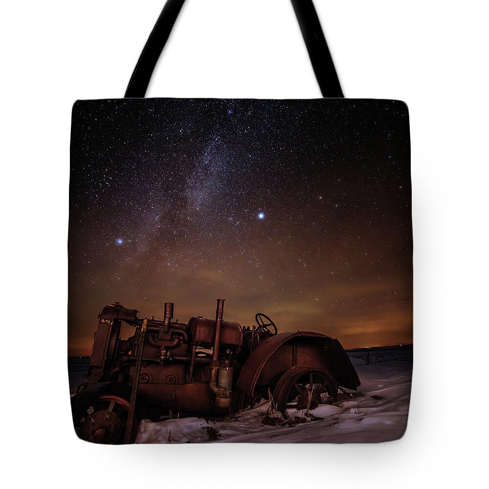 Astro Landscape Scenic Stars Milky Way Winter Antique Tractor Nd Night Night Sky Tote Bag featuring the photograph The Witness by Peter Herman