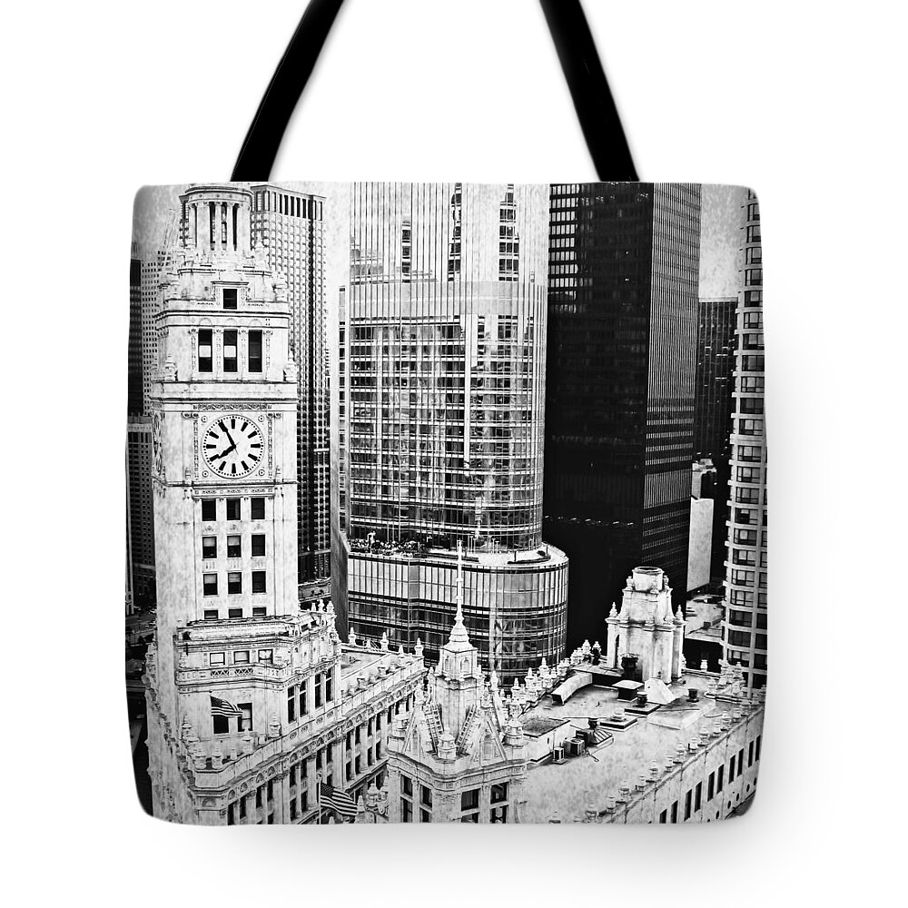 The Wrigley Building Tote Bag featuring the digital art The Wrigley in BW by Mary Pille