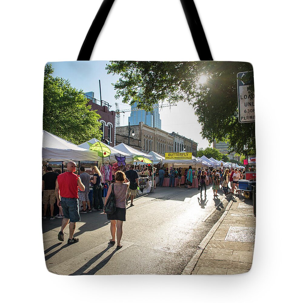 Old Pecan Street Festival Tote Bag featuring the photograph Thousands of people browse arts and crafts tents at the Old Pecan Street Festival by Dan Herron