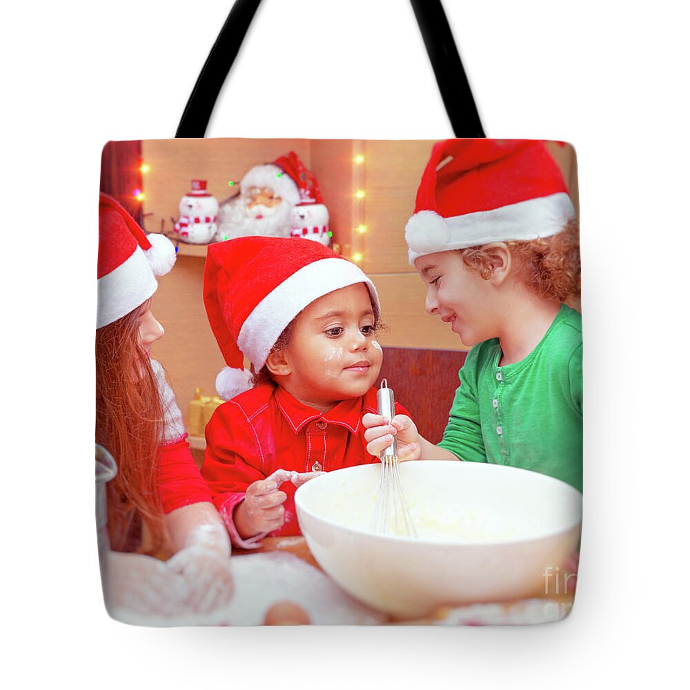 African American Tote Bag featuring the photograph Three kids making Christmas cookies by Anna Om