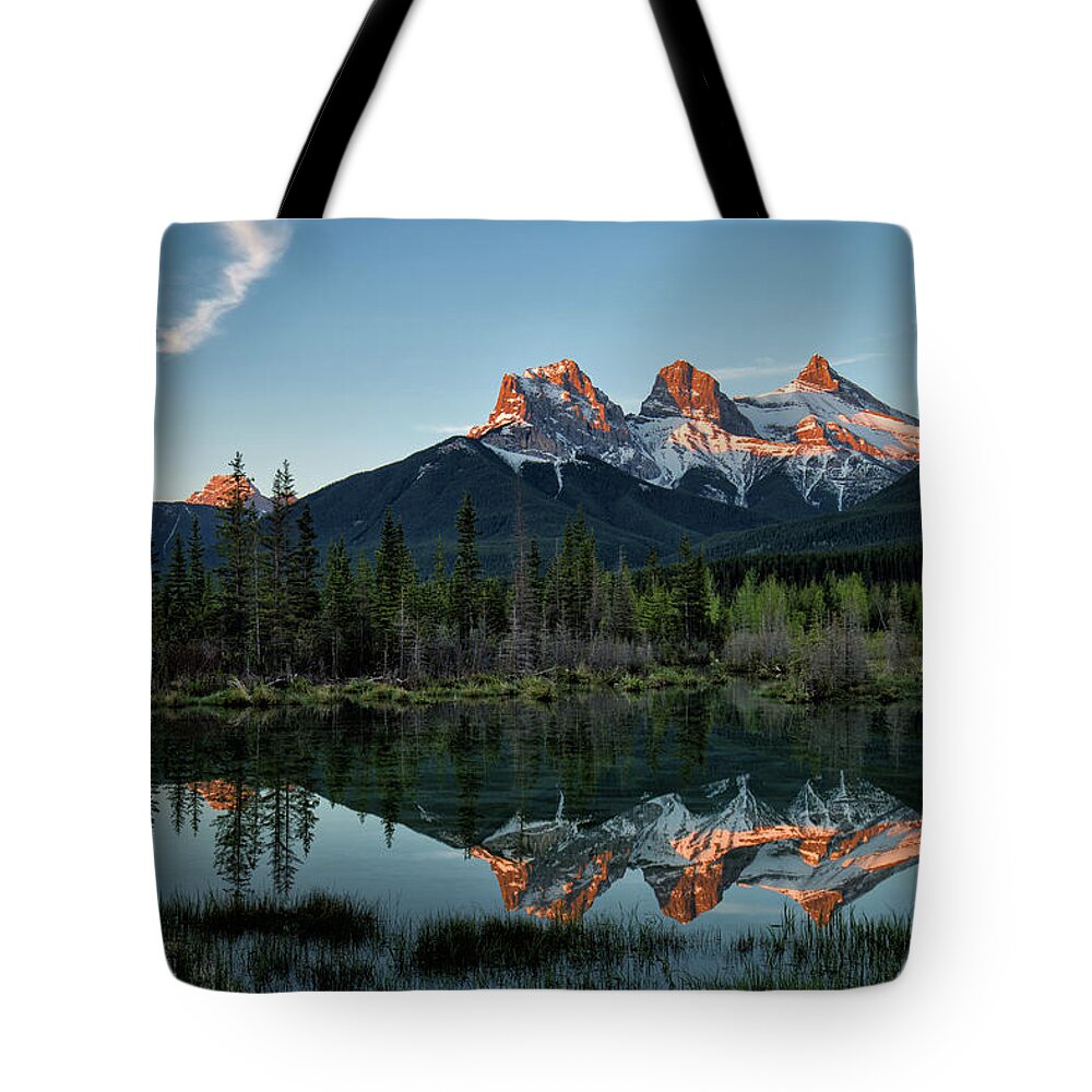 Three Sisters Tote Bag featuring the photograph Three Sisters sunrise by Celine Pollard