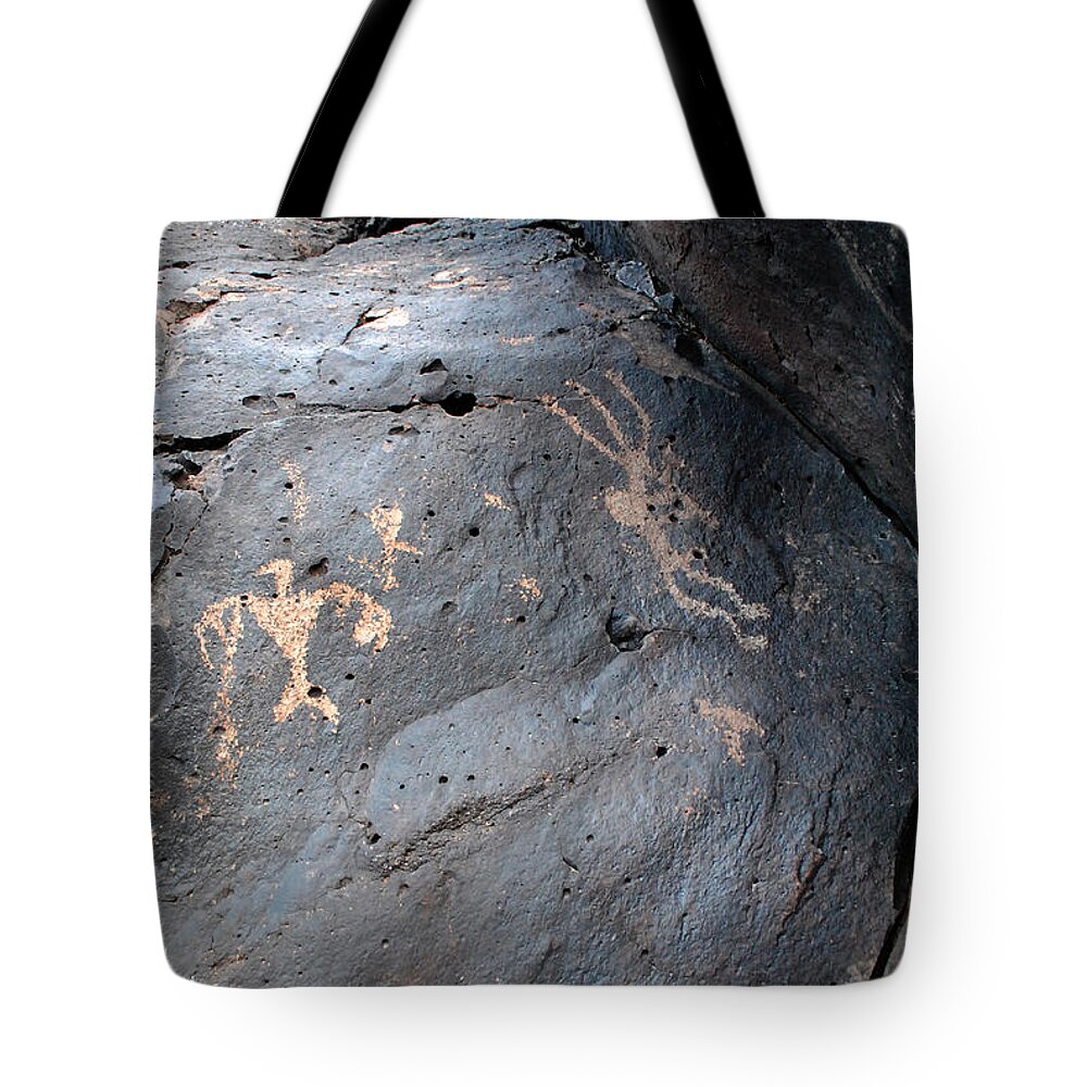 Petroglyphs Tote Bag featuring the photograph Thunderbird Kokopelli by Glory Ann Penington
