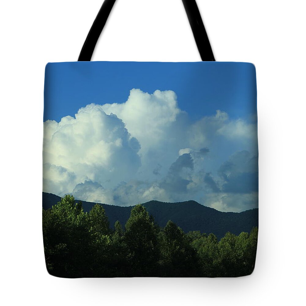 Thunderheads Tote Bag featuring the photograph Thunderhead over mountains by Karen Ruhl