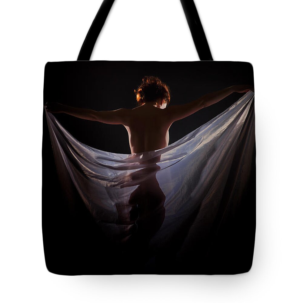 Nude Tote Bag featuring the photograph Tight Hide by Vitaly Vachrushev