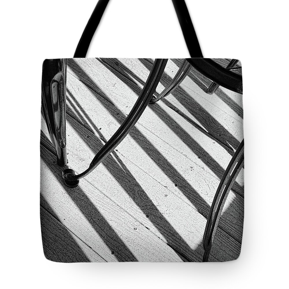 Black And White Tote Bag featuring the photograph Tilt black and white photography by Ann Powell