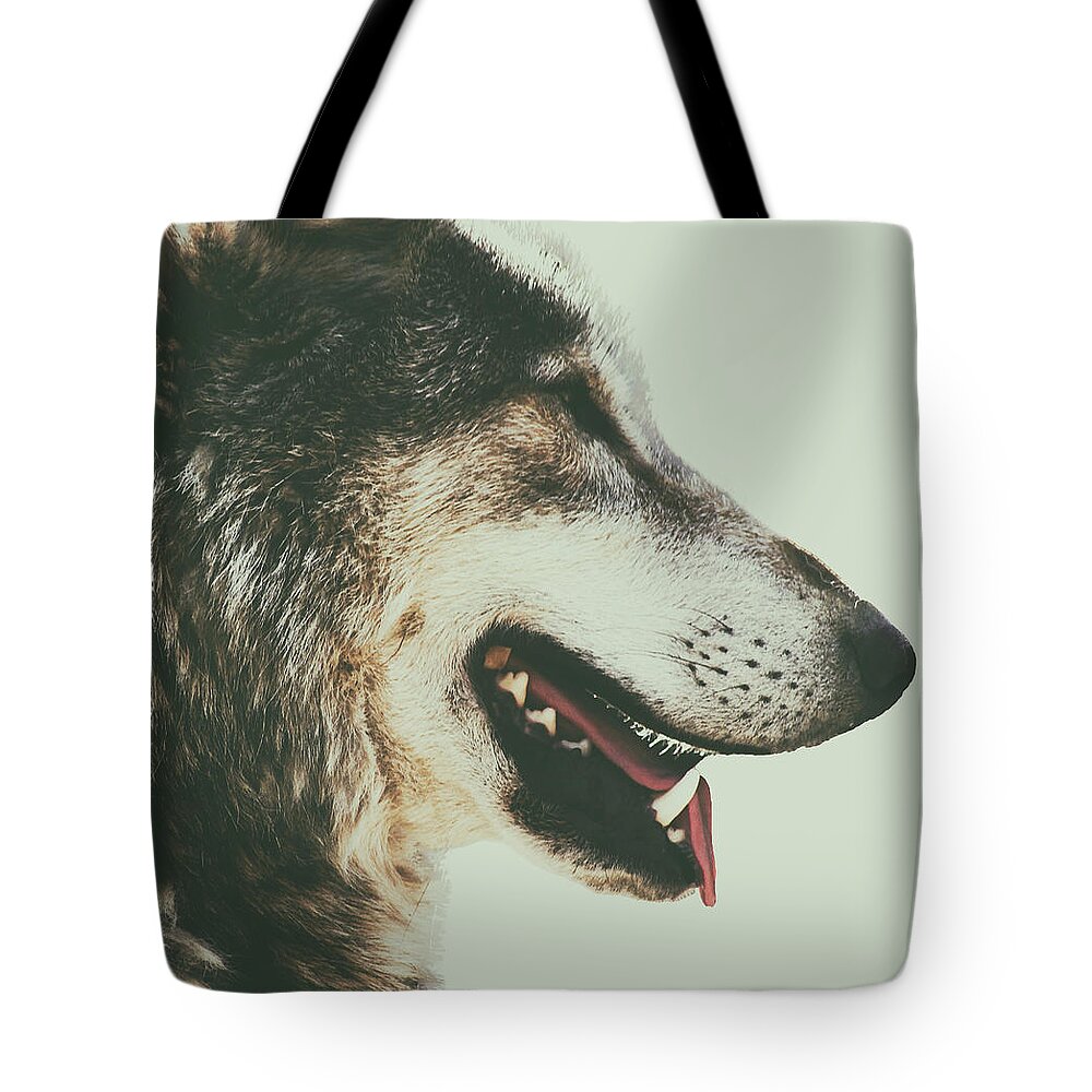 Wolf Tote Bag featuring the photograph Timber Wolf by Martin Newman