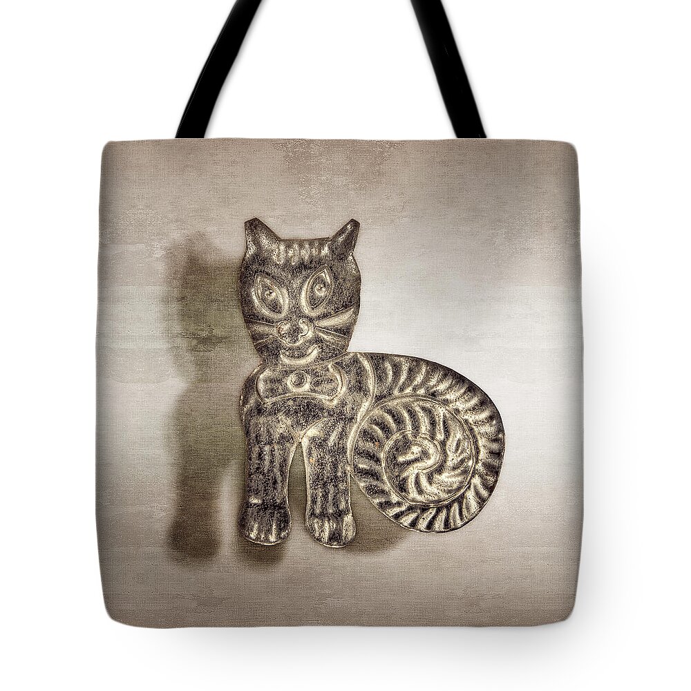 Good Luck Tote Bag featuring the photograph Tin Cat by YoPedro