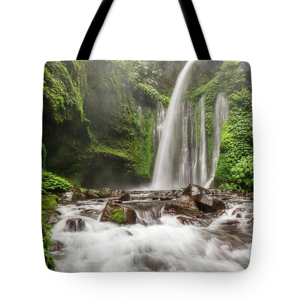 Waterfalls Tote Bag featuring the photograph Tiu Kelep, Lombok waterfall by Pradeep Raja Prints