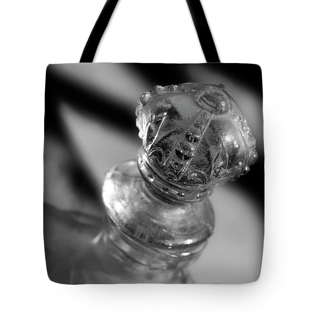 Bottle Tote Bag featuring the photograph Topper by Mike Eingle