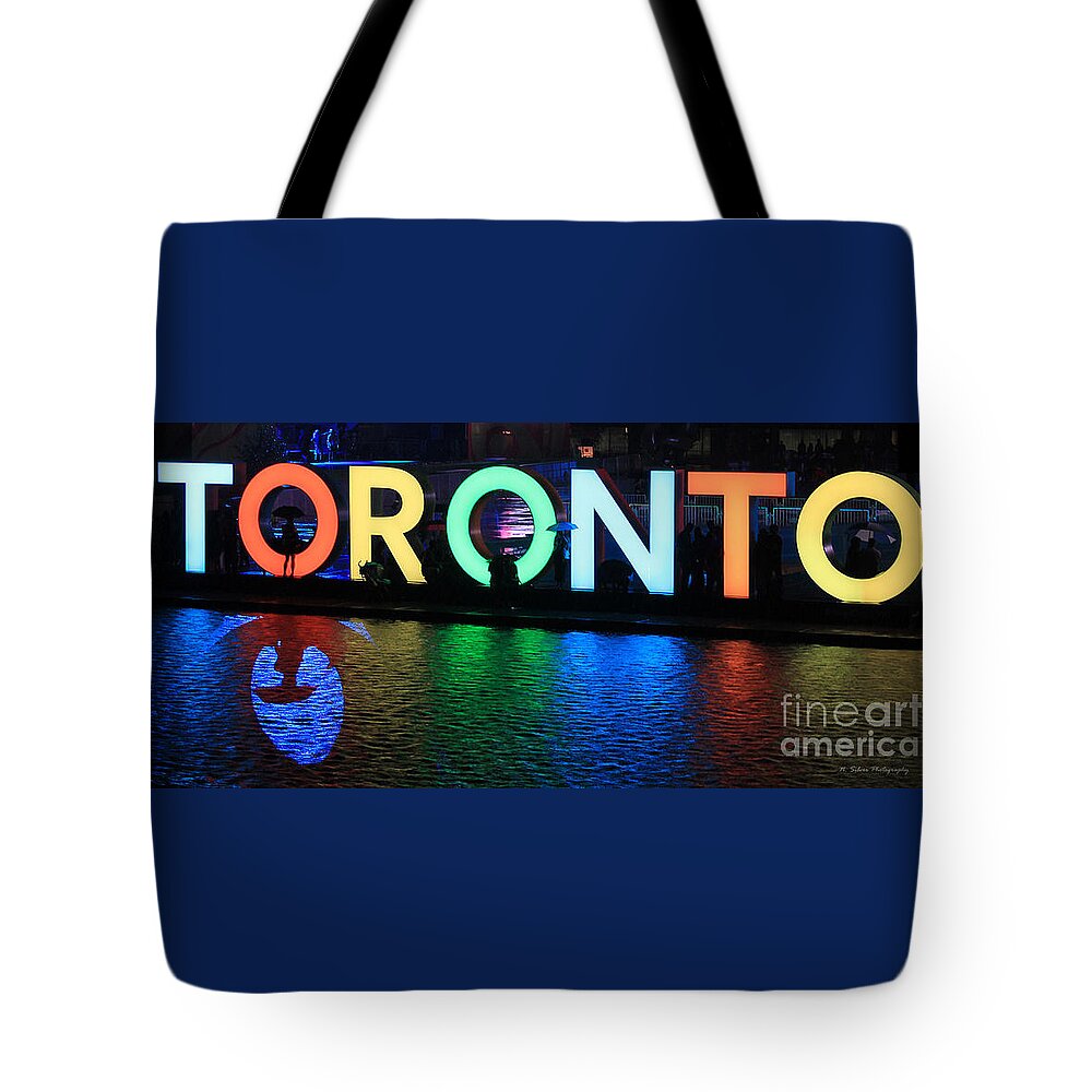 Toronto Tote Bag featuring the photograph Toronto Sign with Umbrella Silhouette by Nina Silver