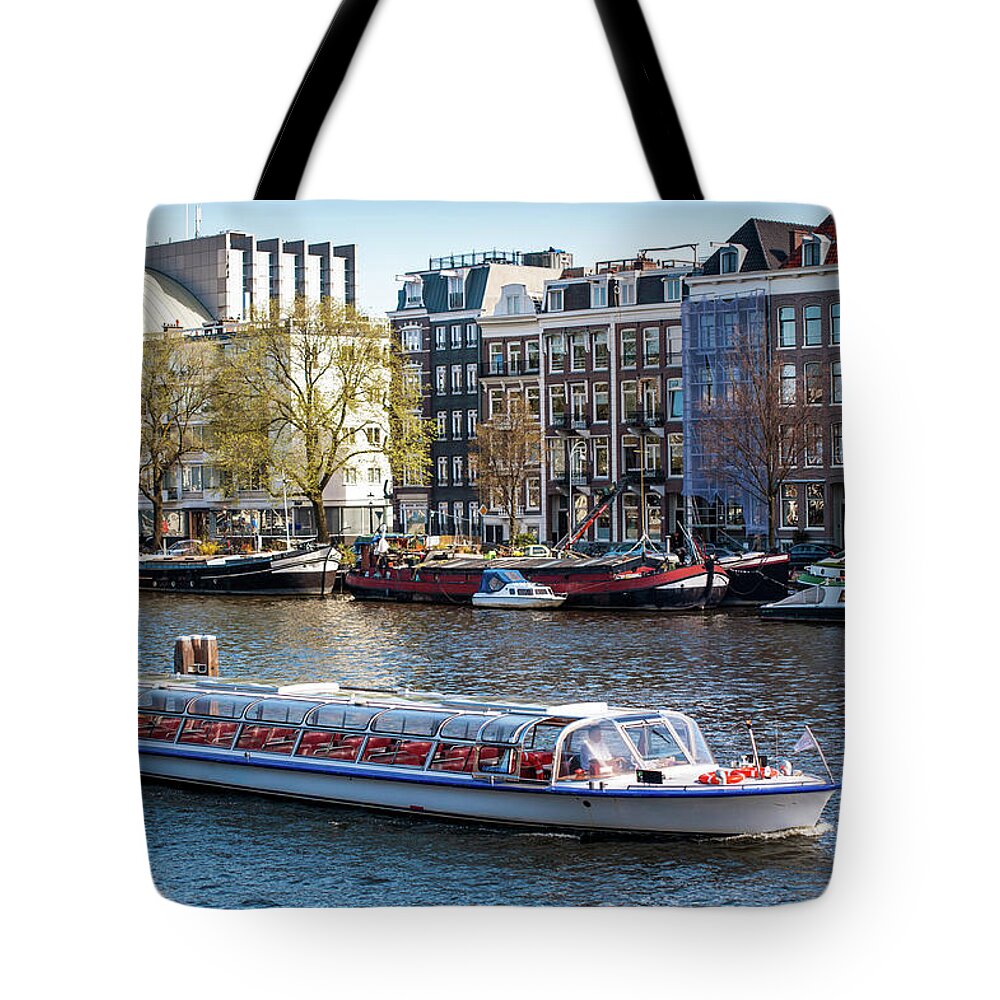 Jenny Rainbow Fine Art Photography Tote Bag featuring the photograph Touristic Boat at Amsterdam Canal by Jenny Rainbow