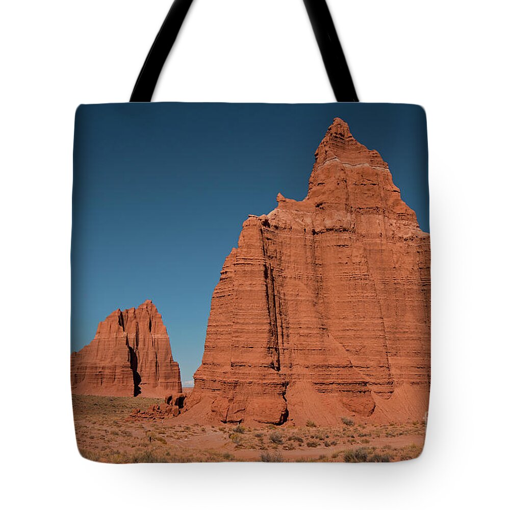 Capital Reef National Park Tote Bag featuring the photograph Tower of the sun and moon by Cindy Murphy - NightVisions