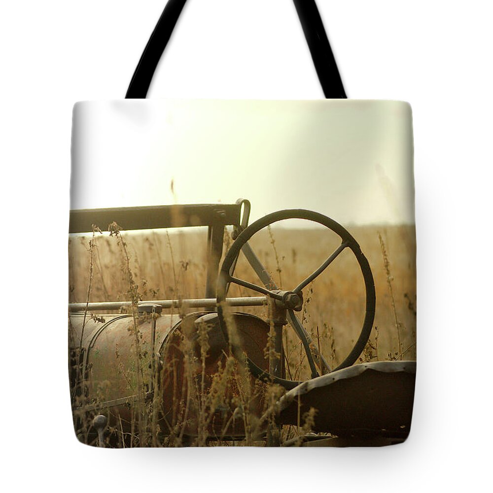 Tractor Tote Bag featuring the photograph Tractor Sunrise by Troy Stapek