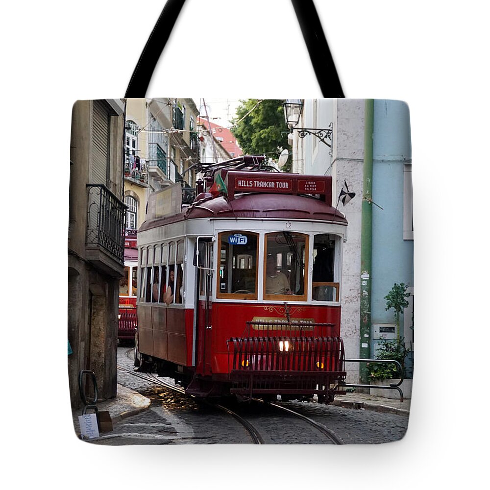 Lisbon Tote Bag featuring the photograph Tram in Lisbon by Jolly Van der Velden