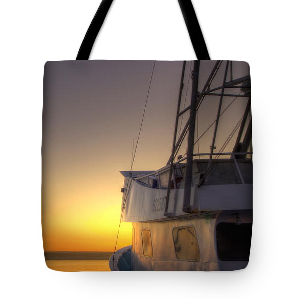 Fishing Boat Tote Bag featuring the photograph Tranquility on the Bay by Mathias 