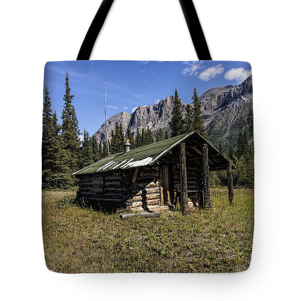 Cabin Tote Bag featuring the photograph Trappers Cabin by Fred Denner