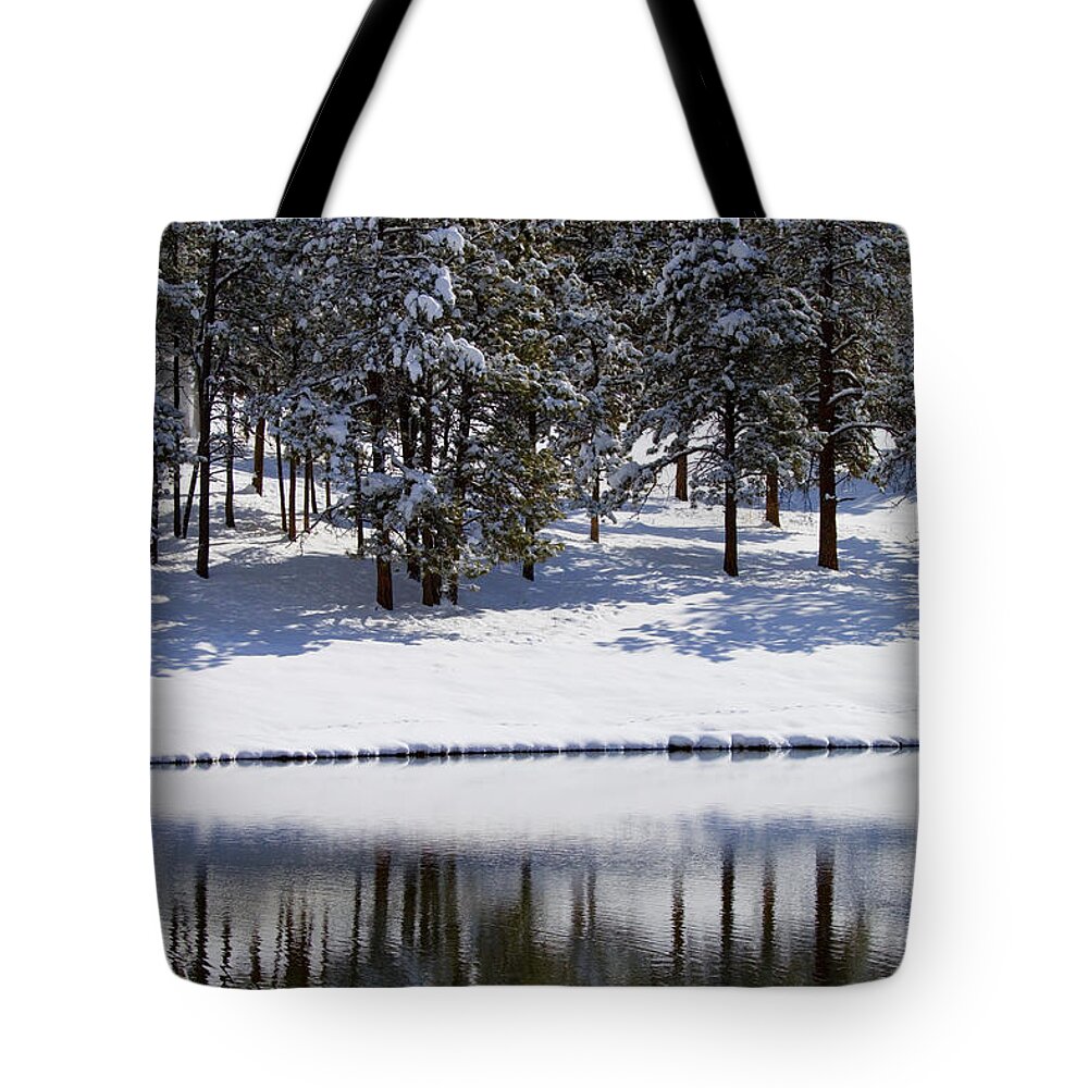 Pond Tote Bag featuring the photograph Trees Reflecting in Duck Pond in Colorado Snow by Steven Krull