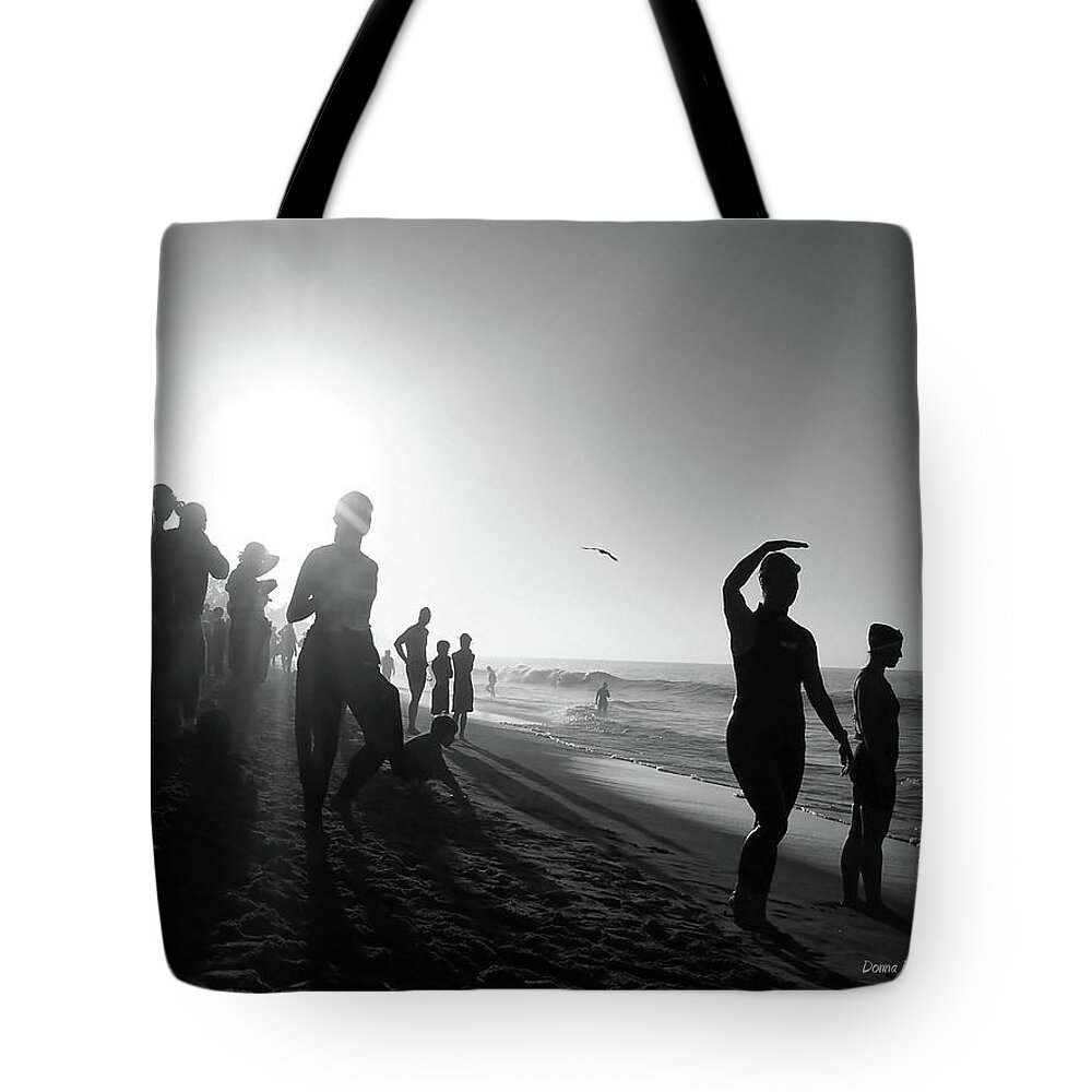 Triatheletes Tote Bag featuring the photograph Triatheletes by Donna Blackhall