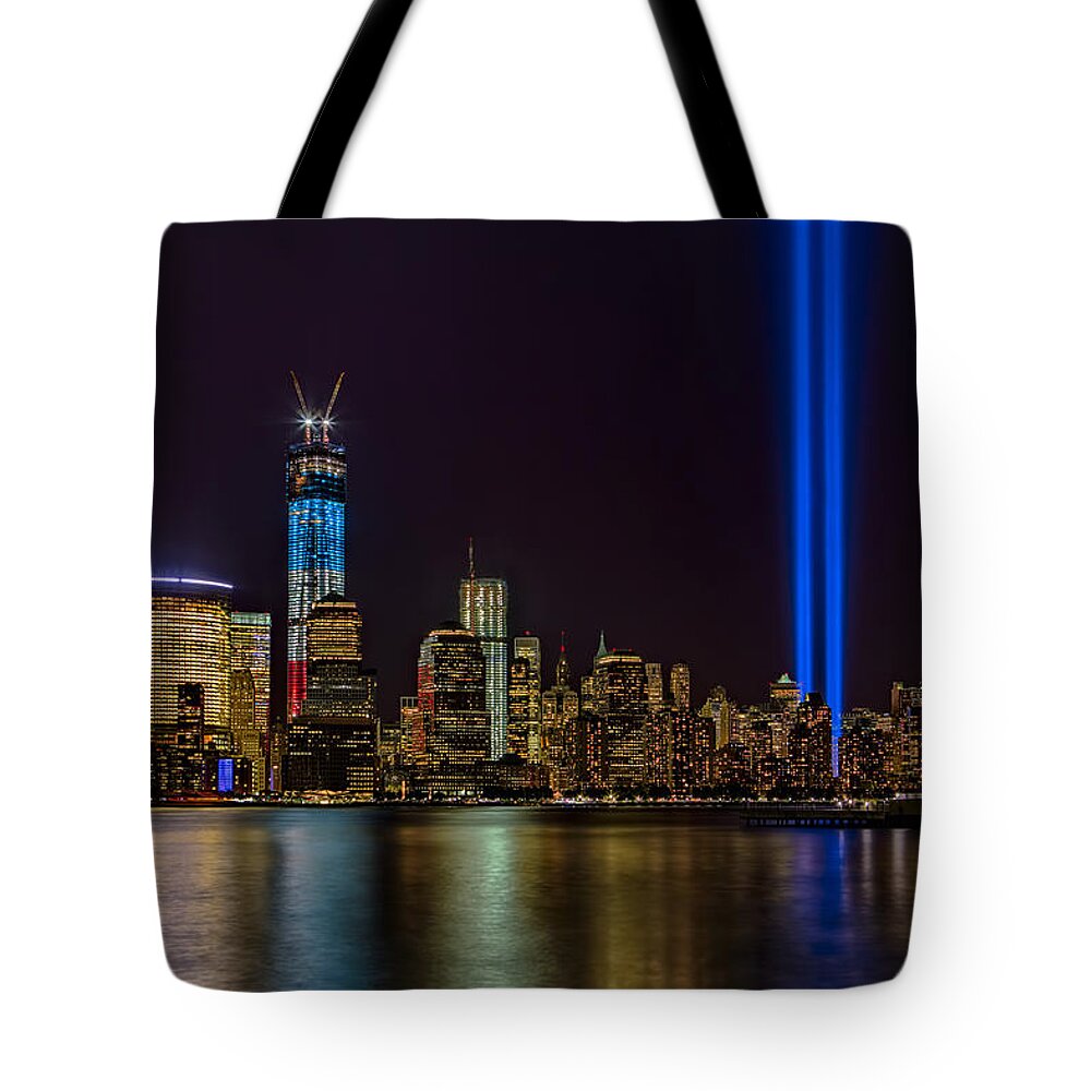 Tribute In Lights Tote Bag featuring the photograph Tribute In Lights Memorial by Susan Candelario