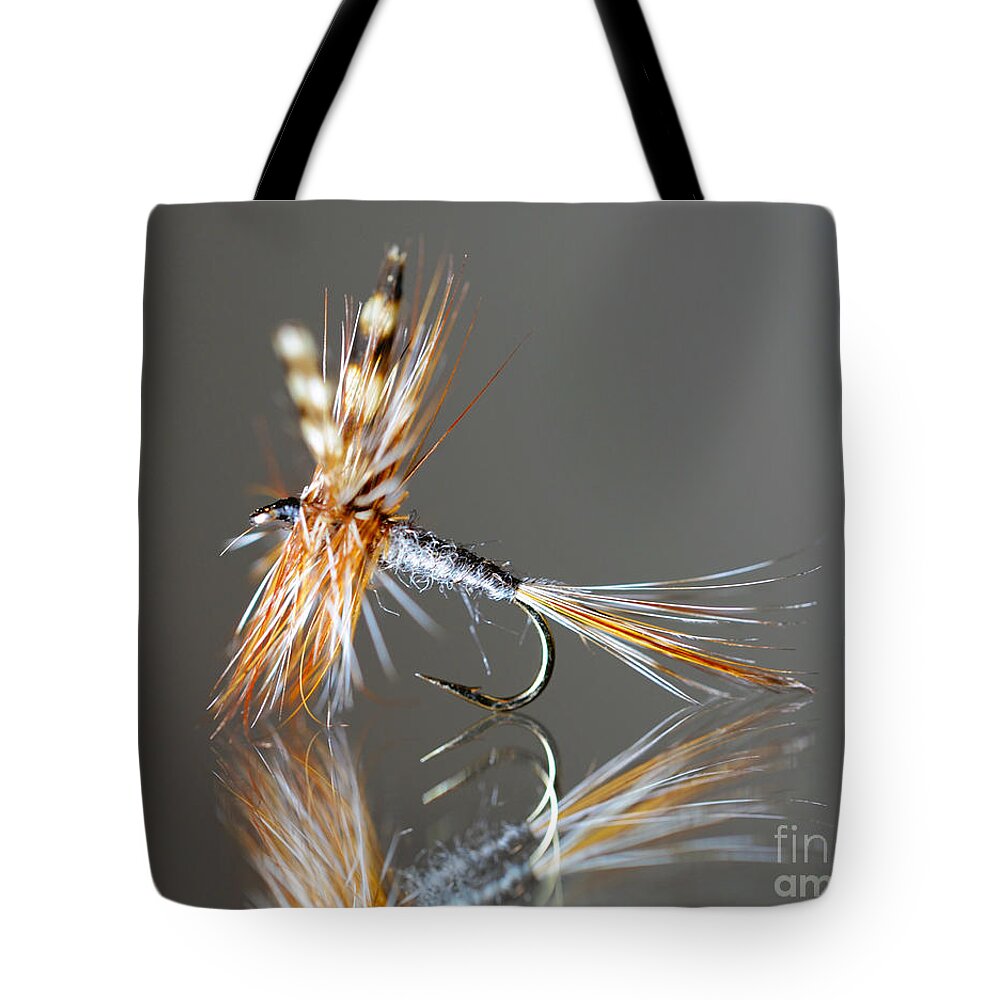 Fly Tote Bag featuring the photograph Trout fly 2 by Glenn Gordon