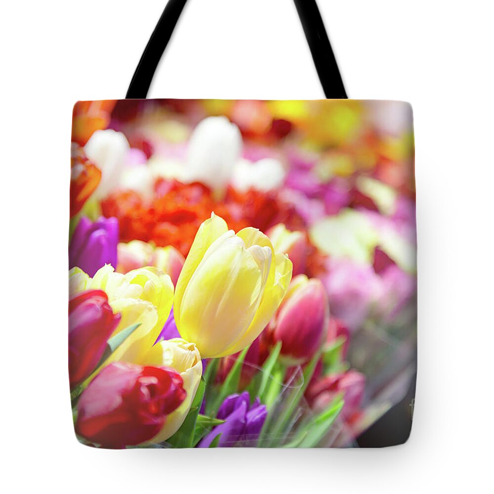 Market Tote Bag featuring the photograph Tulips at a flower market by Jane Rix