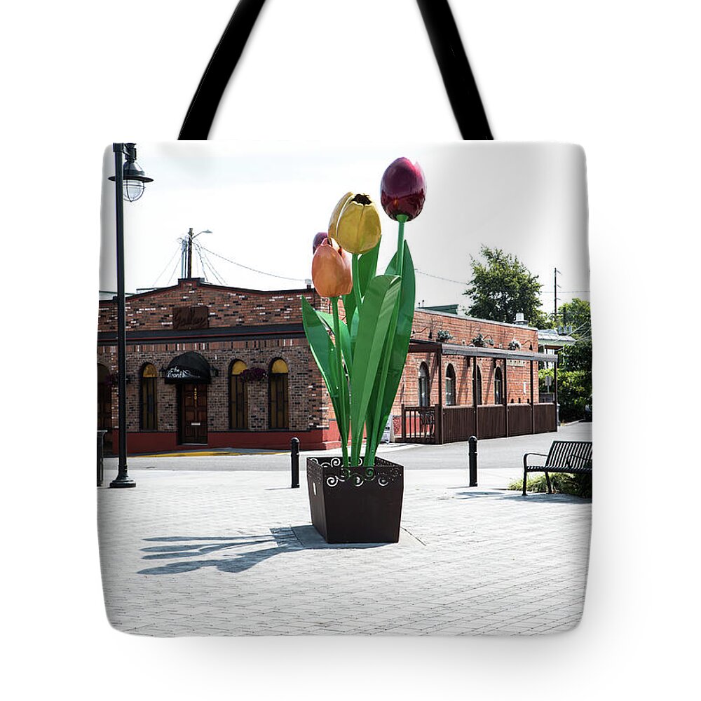 Tulips In Riverfront Park Tote Bag featuring the photograph Tulips in Riverfront Park by Tom Cochran