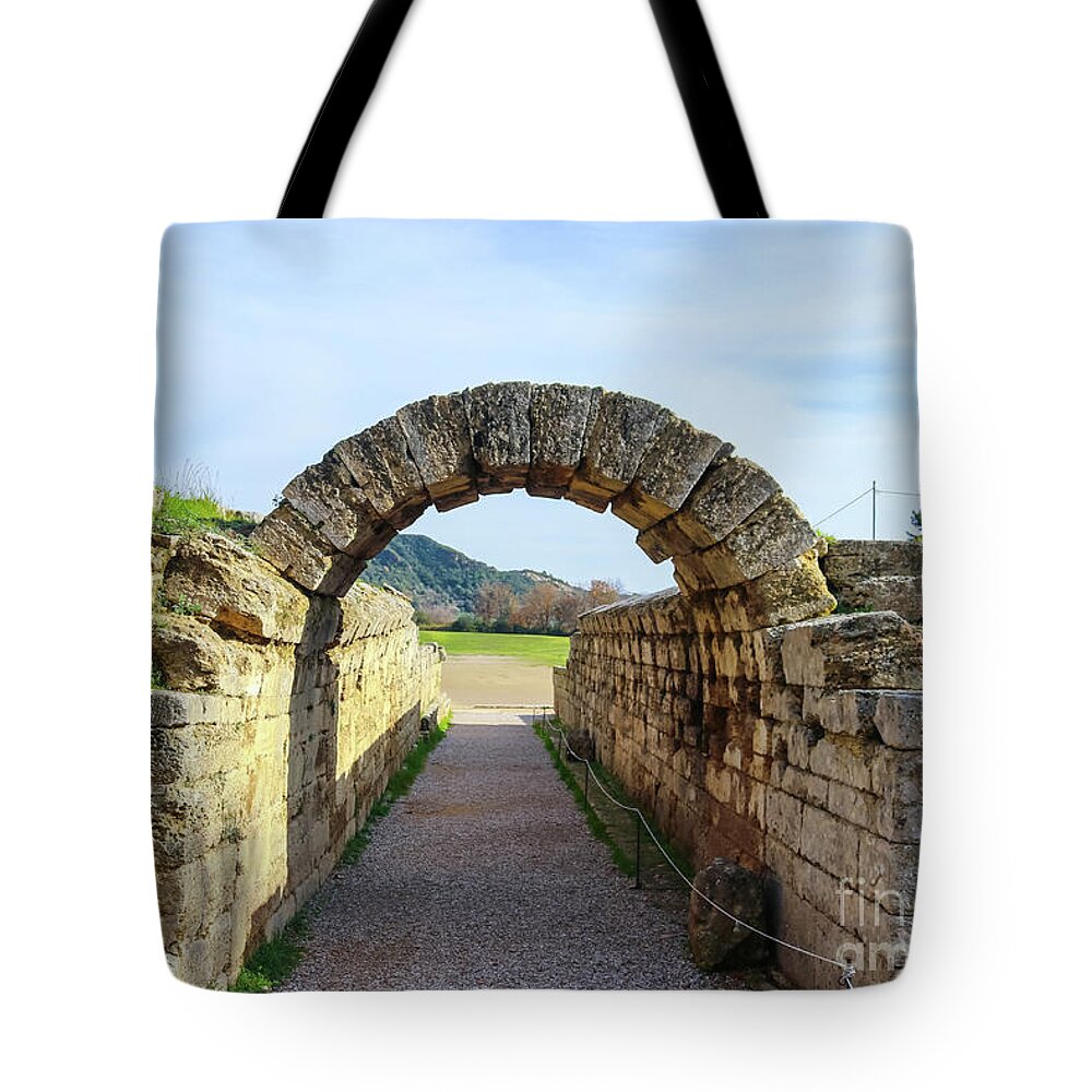 Rebuilt Tote Bag featuring the photograph Tunnel to the field where the original Olympics were held by Susan Vineyard