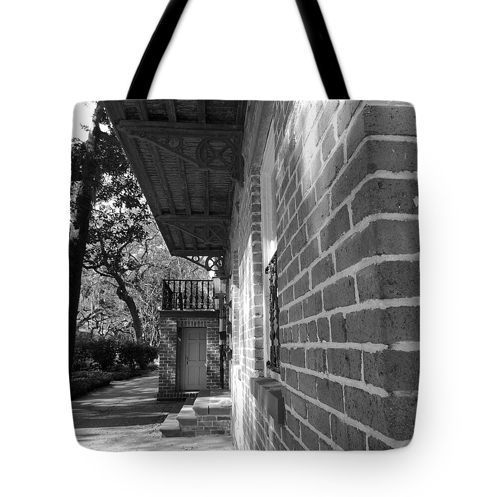 Black And White Tote Bag featuring the photograph Turning a Savannah Corner by Vincent Green