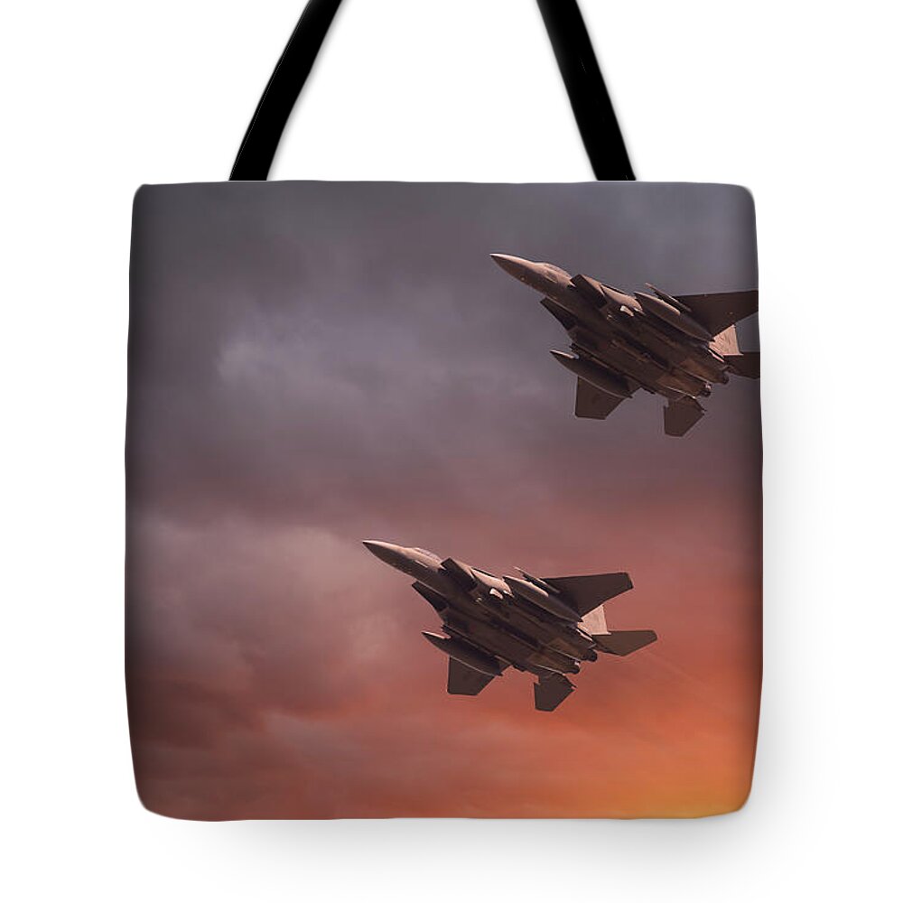 Usaf Tote Bag featuring the photograph Two low flying F-15E Strike Eagles at sunset by Simon Bratt