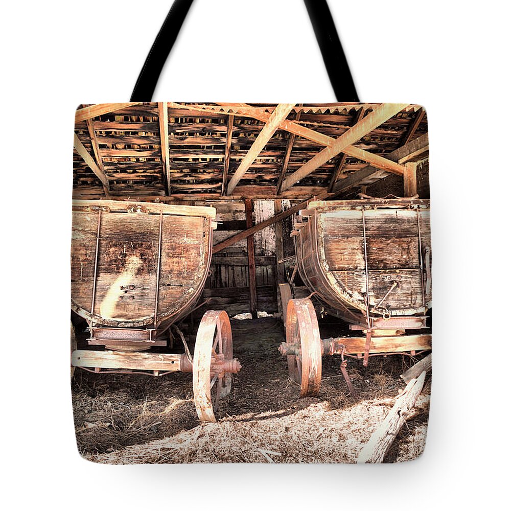 Old Tote Bag featuring the photograph Two old wagons by Jeff Swan